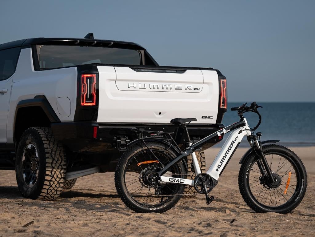 HUMMER EV Ebike behind a HUMMER truck